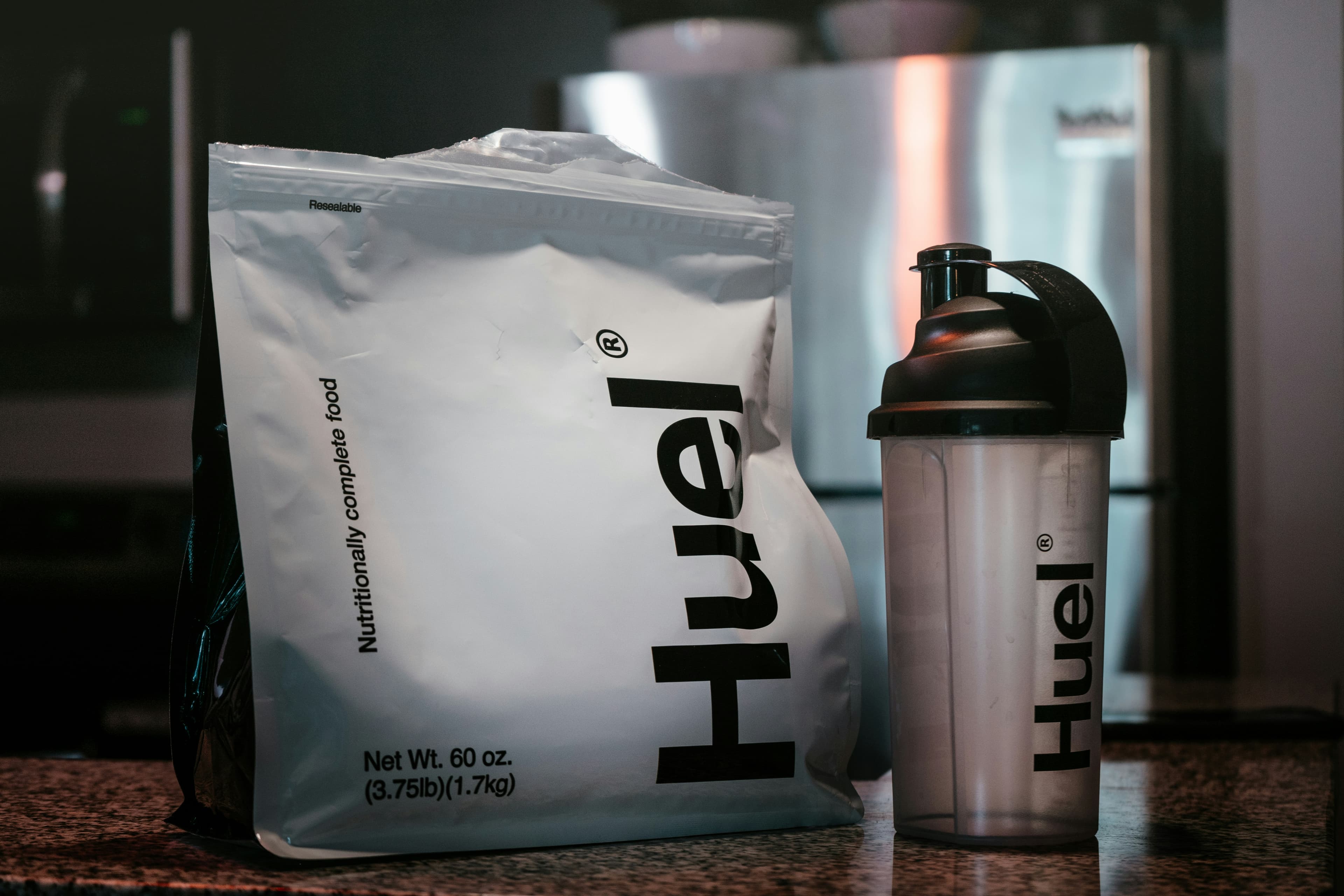 Sports nutrition — protein powder and shaker for strength training